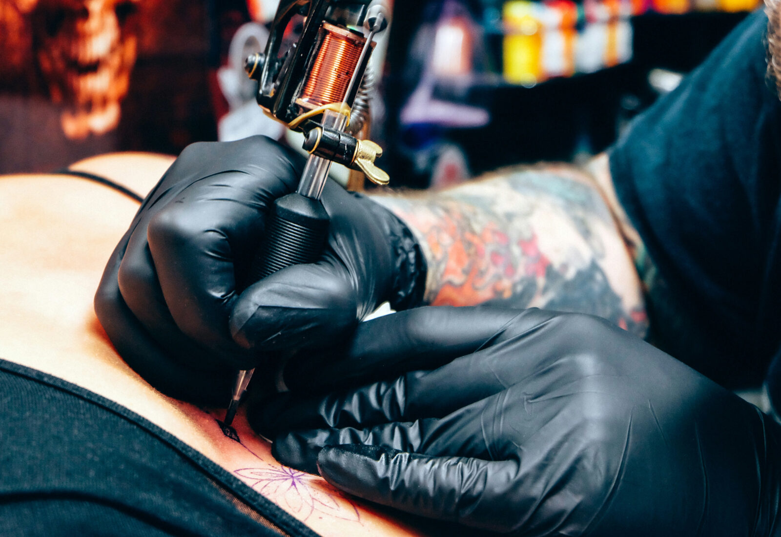 Tattoo artist at work in the studio
